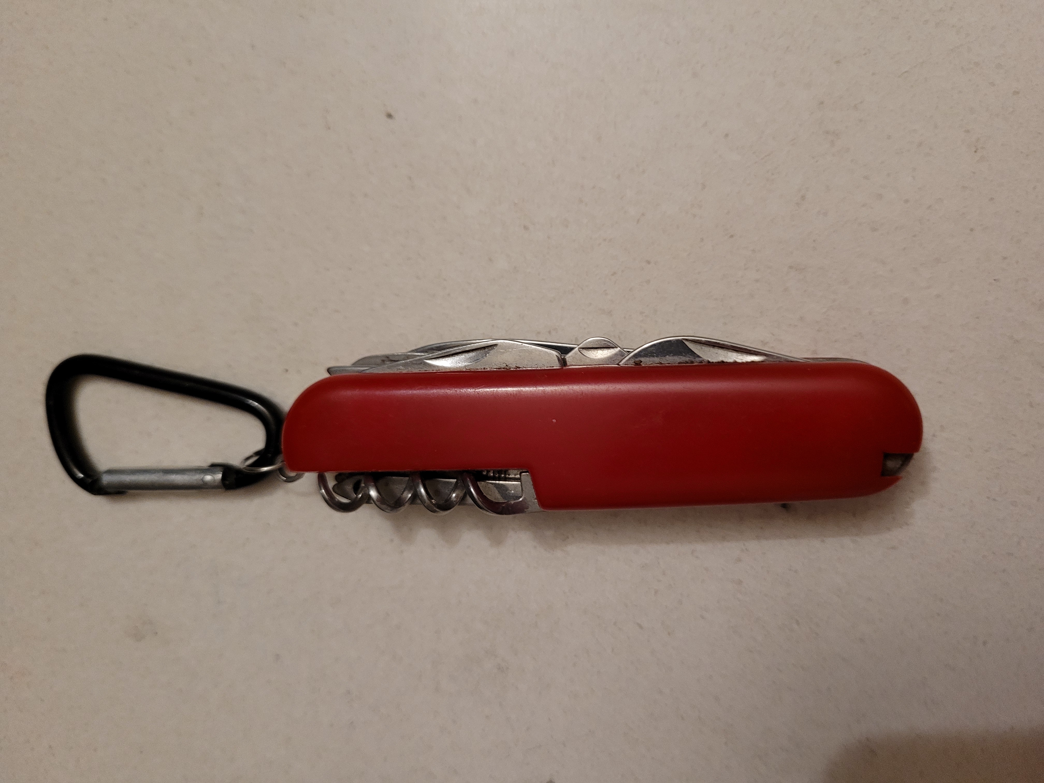 pocket knife with metal clip attached